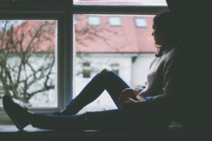 woman sitting full of loneliness